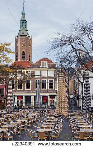 Stock Image - Netherlands, South Holland, Hague, Cafe on courtyard. Fotosearch