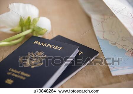 Picture - Passports on table. Fotosearch