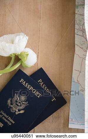 Stock Image - Passports on table. Fotosearch