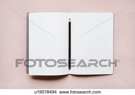 Pencil on open notebook View Large Photo Image Picture - Pencil on open notebook. Fotosearch