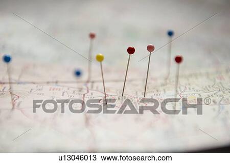 Stock Image - Pins on map. Fotosearch