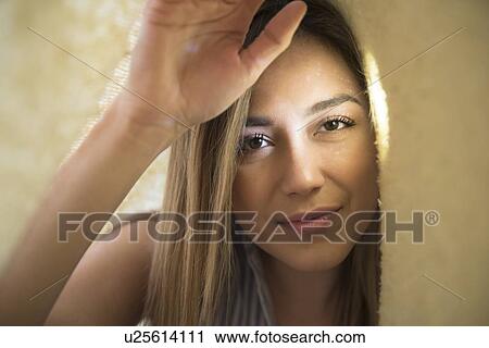 Portrait of young woman under blanket View Large Photo Image Stock Image - Portrait of young woman under blanket. Fotosearch