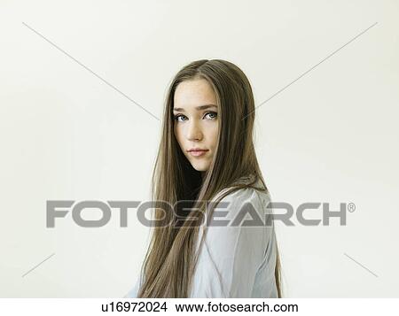 Picture - Portrait of young woman with long brown hair. Fotosearch