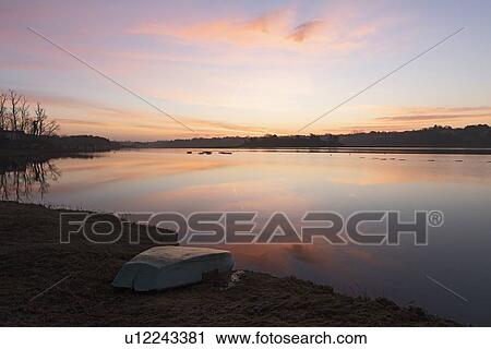 Stock Image - Sea at seunrise. Fotosearch