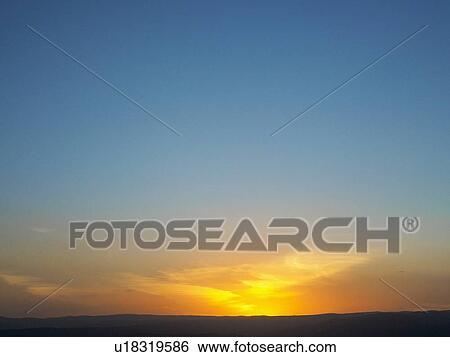Stock Photograph - Sky at sunset. Fotosearch