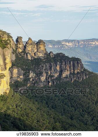 Stock Image - Three Sisters Rock in Blue Mountains National Park. Fotosearch
