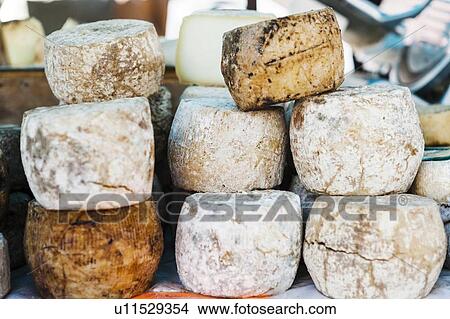 Picture - Traditional cheese on display. Fotosearch