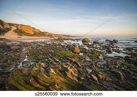 Stock Photo - USA, California, Newport Beach, Rocky beach. Fotosearch