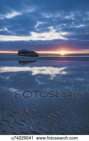 USA, Massachusetts, Cape Cod, Orleans, Rock reflecting in sea at sunset View Large Photo Image Stock Image - USA, Massachusetts, Cape Cod, Orleans, Rock reflecting in sea at sunset. Fotosearch