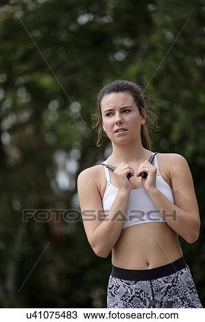 Young woman exercising with jump rope View Large Photo Image Stock Image - Young woman exercising with jump rope. Fotosearch