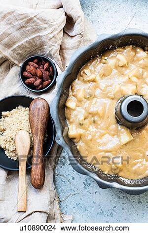 Picture - Batter mix for apple cake. Fotosearch