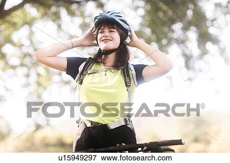 Biker stopping in park View Large Photo Image Stock Photo - Biker stopping in park. Fotosearch