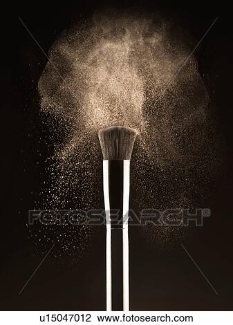 Stock Image - Blusher brush with powder. Fotosearch