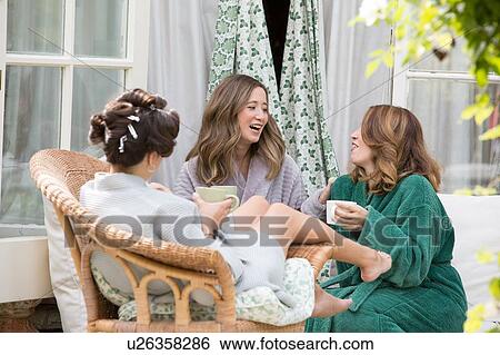 Bride and friends on morning of wedding day View Large Photo Image Stock Photograph - Bride and friends on morning of wedding day. Fotosearch