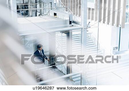 Stock Photo - Businessman leaving on business trip. Fotosearch