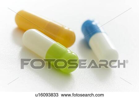 Stock Image - Capsules, studio shot.. Fotosearch