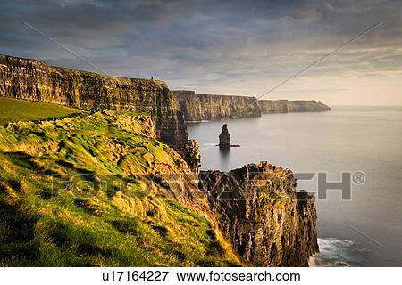 Stock Photo - Cliffs of Moher at sunset, Doolin, Clare, Ireland. Fotosearch