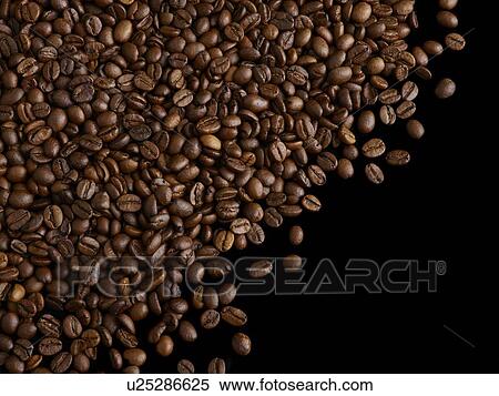 Coffee beans against a black background. View Large Photo Image Stock Photography - Coffee beans against a black background.. Fotosearch