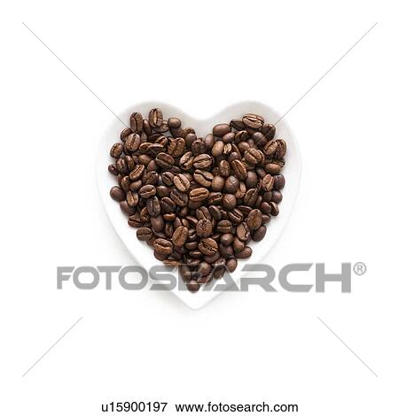 Coffee beans in a heart shape bowl. View Large Photo Image Stock Photo - Coffee beans in a heart shape bowl.. Fotosearch