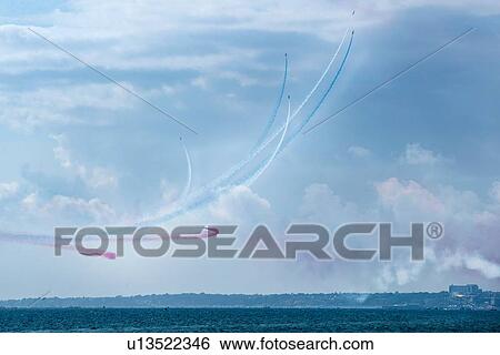 Colourful aerobatics demonstration above sea View Large Photo Image Stock Photograph - Colourful aerobatics demonstration above sea. Fotosearch