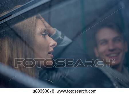 Stock Photo - Couple commuting by bus, Budapest, Hungary. Fotosearch