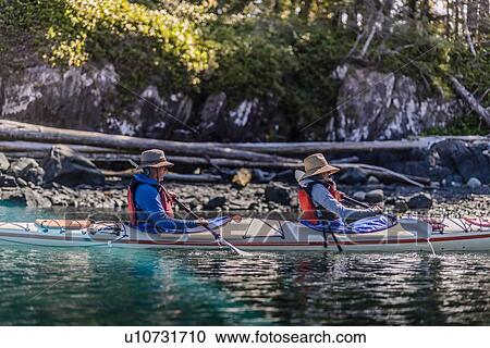 Couple on kayaking trip, Johnstone Strait, Telegraph Cove, Canada View Large Photo Image Stock Image - Couple on kayaking trip, Johnstone Strait, Telegraph Cove, Canada. Fotosearch