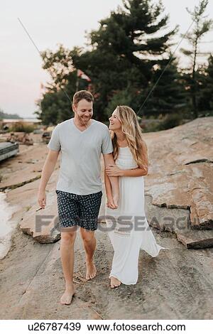 Stock Photo - Couple walking in Algonquin Park, Canada. Fotosearch