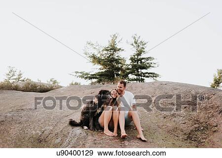 Couple with pet dog, Algonquin Park, Canada View Large Photo Image Stock Photo - Couple with pet dog, Algonquin Park, Canada. Fotosearch