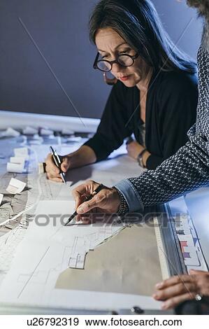 Stock Photo - Couple working in home office. Fotosearch