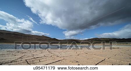 Stock Photo - Cracked, dried mud, Iceland.. Fotosearch