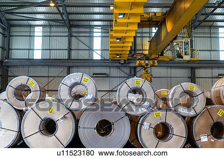 Crane over rows of sheet steel in storage at port View Large Photo Image Stock Image - Crane over rows of sheet steel in storage at port. Fotosearch