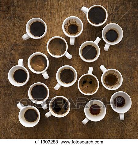 Stock Photo - Cups of coffee, high angle view.. Fotosearch