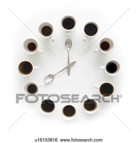 Stock Photograph - Cups of coffee making the shape of a clock.. Fotosearch