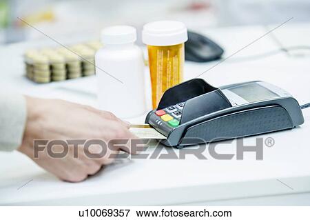Customer paying bill in pharmacy. View Large Photo Image Stock Photo - Customer paying bill in pharmacy.. Fotosearch
