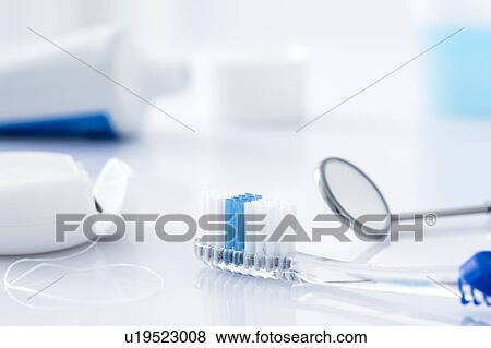 Dental equipment against a white background. View Large Photo Image Stock Photo - Dental equipment against a white background.. Fotosearch