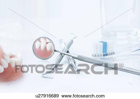 Dental equipment against a white background. View Large Photo Image Stock Photo - Dental equipment against a white background.. Fotosearch
