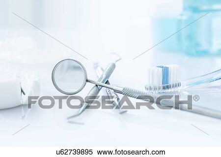 Stock Photography - Dental equipment against a white background.. Fotosearch