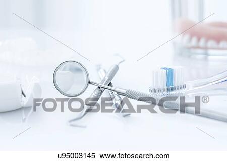 Stock Photography - Dental equipment against a white background.. Fotosearch
