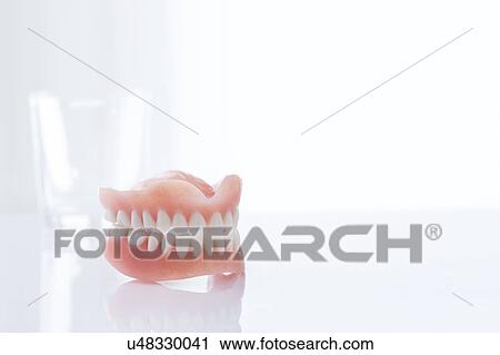 Stock Image - Dentures against a white background.. Fotosearch