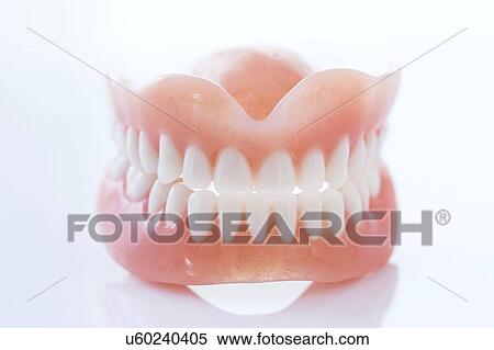Stock Photography - Dentures against a white background.. Fotosearch