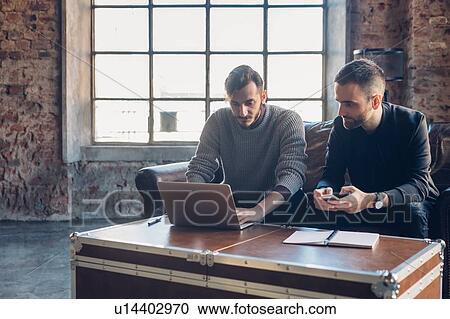 Designers at work in studio View Large Photo Image Stock Image - Designers at work in studio. Fotosearch