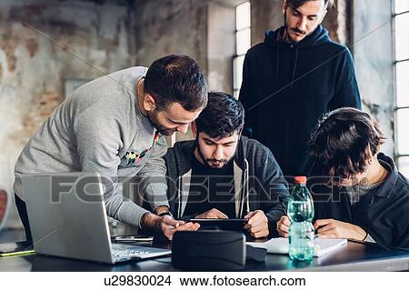 Designers brainstorming in studio View Large Photo Image Picture - Designers brainstorming in studio. Fotosearch