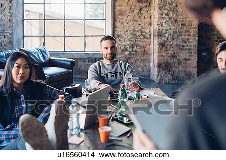 Picture - Designers having meeting in studio. Fotosearch