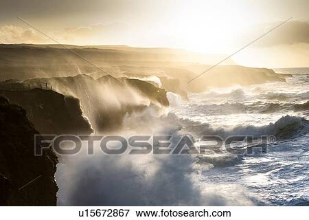 Stock Photo - Doolin Cliffs getting hit by giant storm, Doolin, Clare, Ireland. Fotosearch