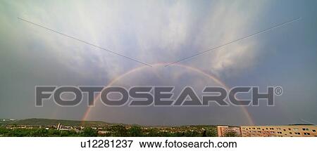 Double rainbow over city. View Large Photo Image Stock Photo - Double rainbow over city.. Fotosearch