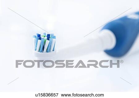 Stock Photo - Electric toothbrush against a white background.. Fotosearch
