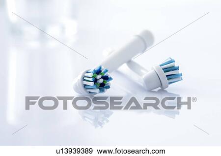 Stock Photo - Electric toothbrush heads against a white background.. Fotosearch