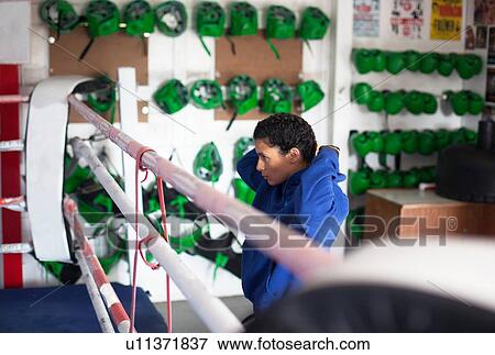 Stock Photo - Female boxer in gym. Fotosearch