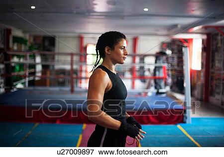 Female boxer in gym View Large Photo Image Stock Photo - Female boxer in gym. Fotosearch