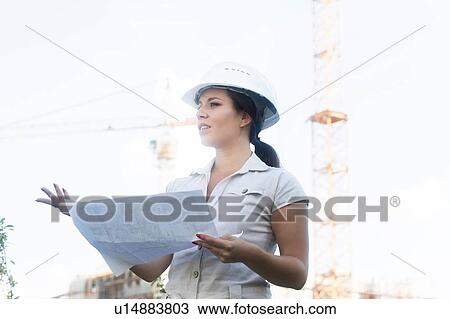 Female engineer at site View Large Photo Image Stock Image - Female engineer at site. Fotosearch